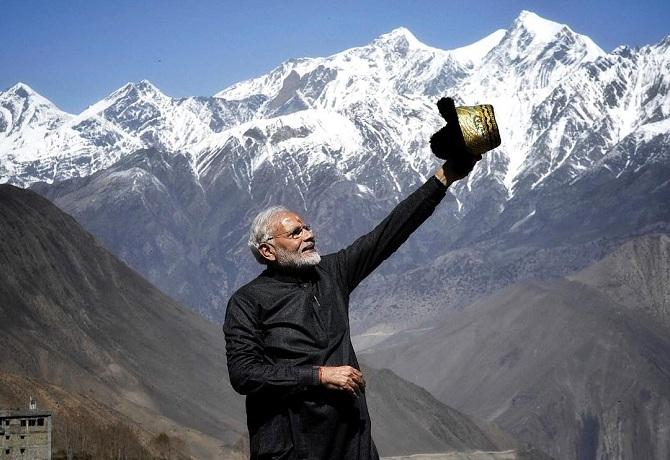 Looks like the selfie pose, doesn't it? Narendra Modi captioned the picture as, 