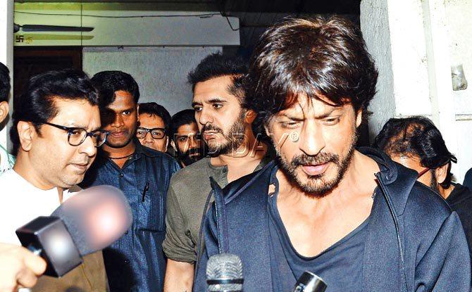 In picture: Bollywood star Shah Rukh Khan at Raj Thackeray's residence in Dadar.