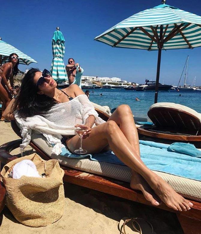 This picture was from her vacation trip to Nammos Mykonos where she is seen sunbathing at the beautiful beach.