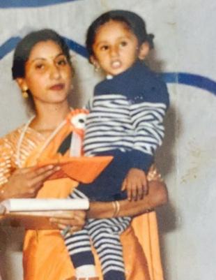 Honey Singh created a huge rage in Bollywood through chartbusters like Blue Eyes, Chaar Botal Vodka featuring Sunny Leone, Love Dose and Urvashi Rautela. His hip-hop songs became so popular that filmmakers wanted to have a 'Honey Singh song' in their films.
Pictured: A young Hirdesh looks all happy in his mother's arms.