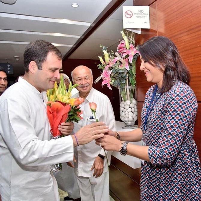 This picture was shared by Priya Dutt's husband Owen Roncon in which Priya presents a rose to Rahul Gandhi as former chief minister of Maharashtra Sushilkumar Shinde looks on.