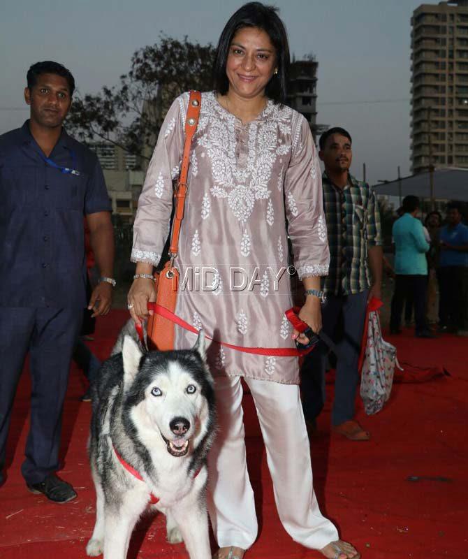 In picture: Priya Dutt poses with her pet dog Mauser at a pets carnival in Mumbai.