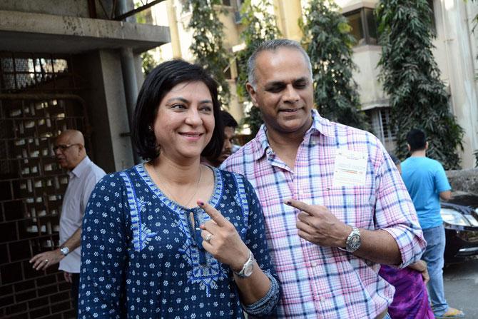 In picture: Priya Dutt poses with husband Owen Roncon after casting their votes during the 2017 BMC election.