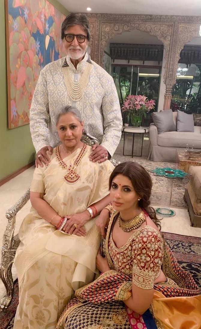 Shweta Bachchan gracefully poses with her father Amitabh Bachchan and Shweta Bachchan, as they dress up for Akash Ambani's wedding celebration.