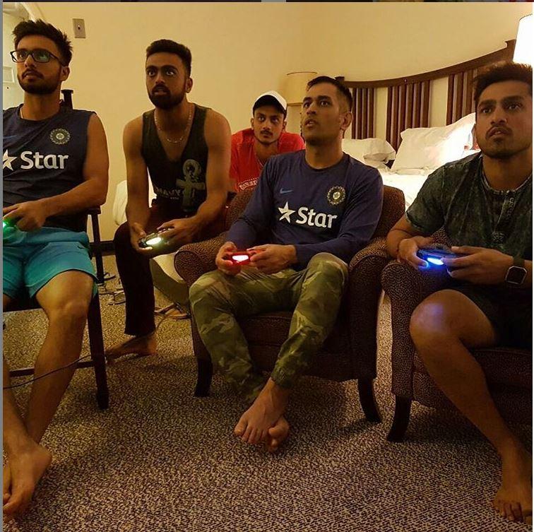 MS Dhoni playing some football video games with fellow cricketers, including Axar Patel and Jaydev Unadkat. he captioned, 