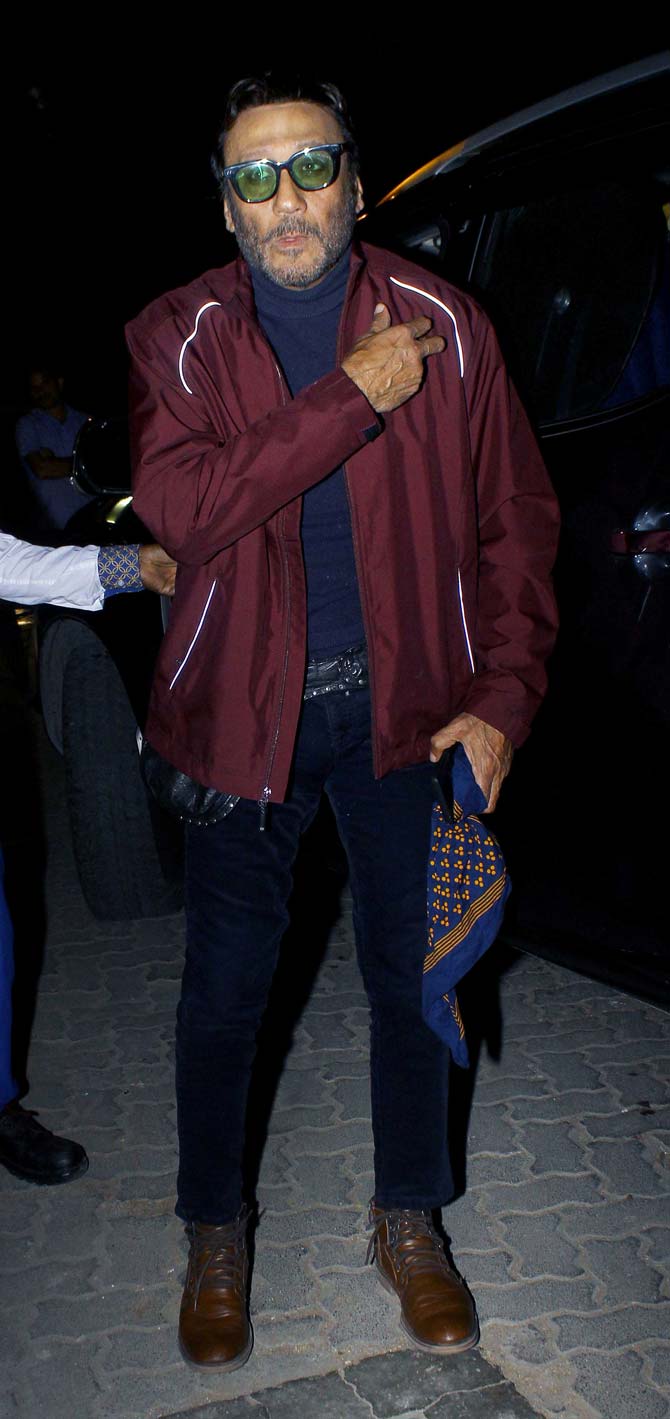 Jackie Shroff looked dapper in a burgundy jacket, paired with black denim and a turtle neck t-shirt for the celebration. 