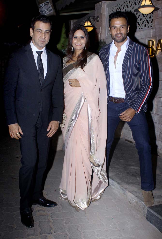 Ronit Roy, wife Neelam, and brother Rohit Roy posed for the paps as they arrived at the launch party of a restaurant, held in South Mumbai. 