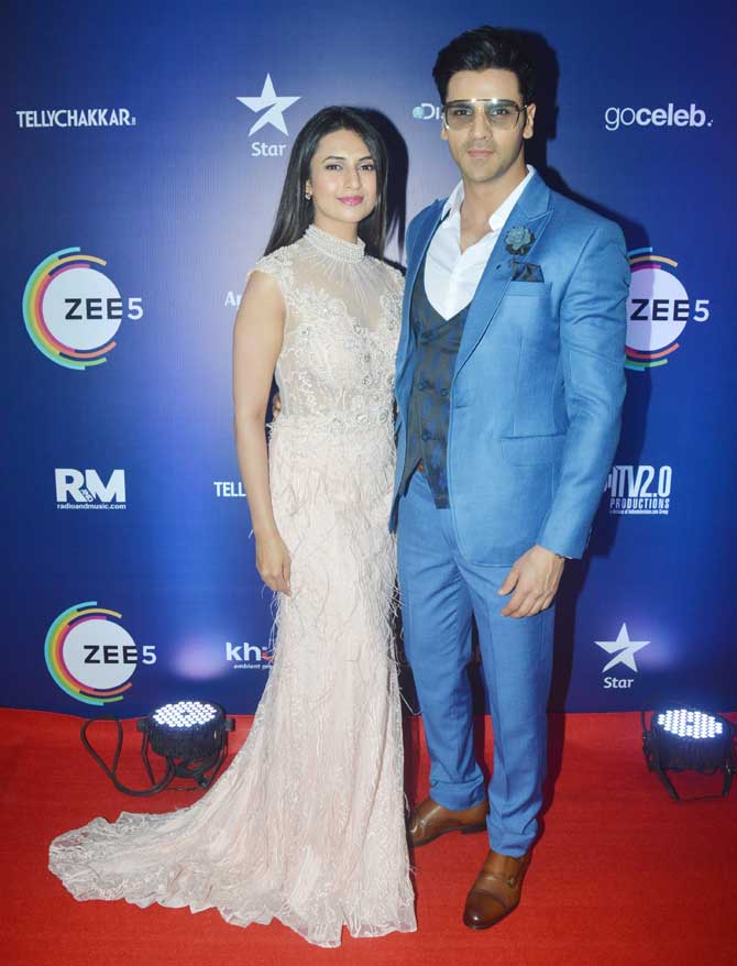 Divyanka Tripathi and Vivek Dahiya attended Indian Telly Awards 2019 held at a plush hotel in Vile Parle, Mumbai. While Divyanka looked vision in white in this gown, Vivek showed off his uber cool side in a blue suit. All pictures/Yogen Shah