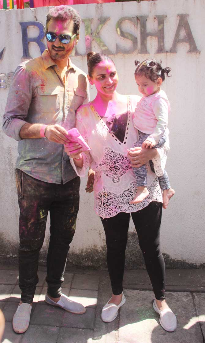 Esha Deol and husband Bharat Takhtani also hosted a Holi party at their residence in Bandra which was attended by a host of Bollywood celebs.
In picture: Bharat Takhtani with Esha Deol and daughter Radhya Takhtani.