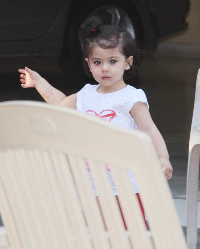 Inaaya Naumi Kemmu was spotted with brother Taimur Ali Khan at a playground in Bandra, Mumbai. The tiny tot looked adorable in her white baby top, paired with red baby pants during the playdate. All pictures/Yogen Shah