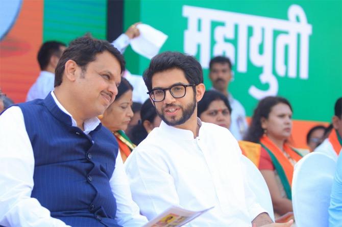 In picture: Aaditya Thackeray and Devendra Fadnavis engage in a deep and candid conversation at an event in Palghar.