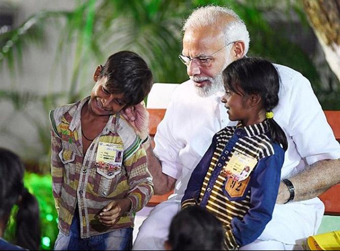 These cute pictures prove Narendra Modi is every child’s favourite