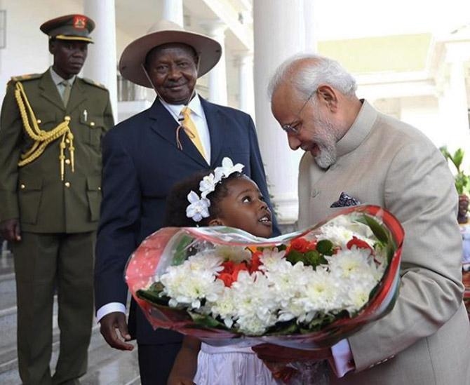Narendra Modi was touched by this little girl's cuteness in a ceremonial welcome planned for him at Uganda