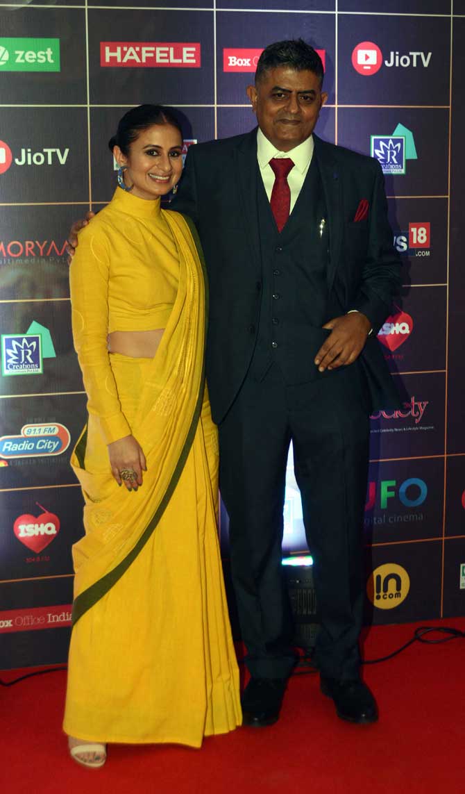 Rasika Dugal and Gajraj Rao were all smiles when clicked by the paparazzi at the red carpet event held in the city. 