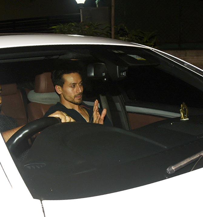 Tiger Shroff waved at the paparazzi as she attends the special screening of Pranutan's Bollywood debut, Notebook.