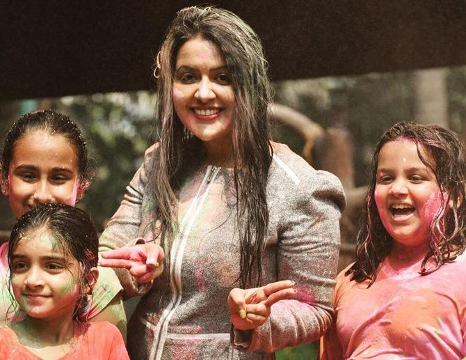 In pic: Amruta Fadnavis celebrates the festival of colours with her adorable daughter Divija Fadnavis and other children