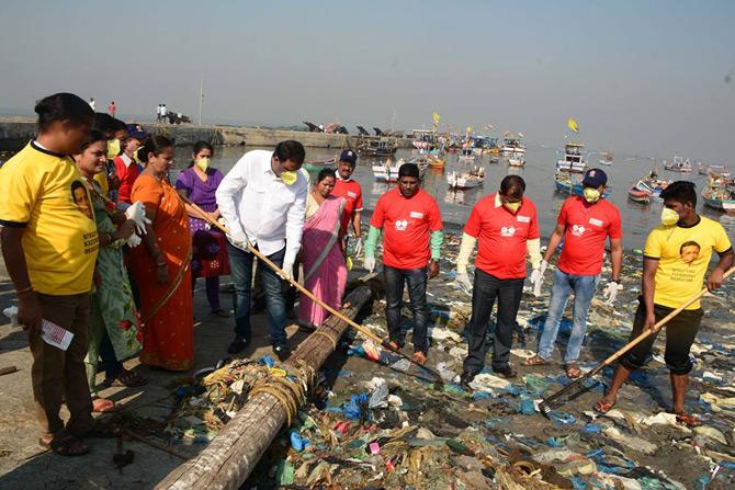 In picture: Ashish Shelar participating in a clean-up drive at the Chimbai Beach in Bandra.