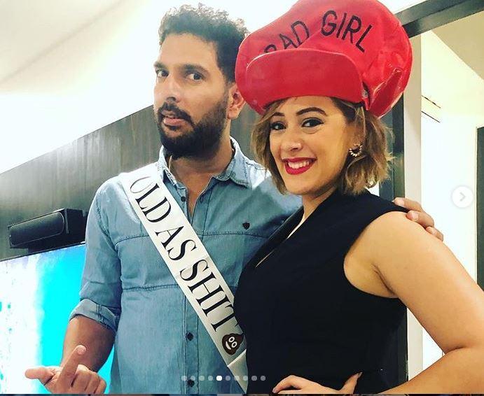 Yuvraj Singh posted this picture with his wife Hazel Keech on her birthday with some cool sashes and captioned, 