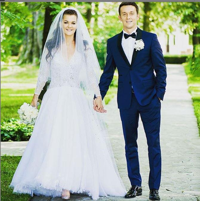 Agnieszka Radwanska and Dawid Celt got engaged in 2016. The couple got married on July 22, 2017.
In picture: Agnieszka Radwanska and husband on their wedding day. She called it the 'happiest day of my life'