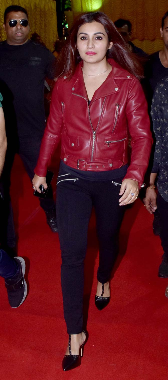 Rimi Sen attended a school annual event held in Versova, Mumbai. The actress, who was spotted at a public outing after a very long time, sported a red leather jacket, paired with black jeggings and stilettoes. All pictures/Yogen Shah
