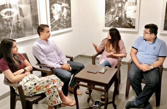In photo: Milind Deora having a candid conversation with three millennials as he discusses the relationship between social media and politics with them.