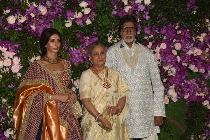 Amitabh Bachchan walked in later with wife Jaya Bachchan and daughter Shweta Bachchan Nanda for the wedding. Shweta looked all elegant in a never-too-old blue and red lehenga with golden work on the entire couture. Jaya and Amitabh kept it simple - the veteran actress looked ethereal in a golden white saree, whereas Big B looked uber cool in a white and blue kurta, paired with white pajama as they posed for the photographers at the wedding