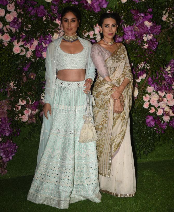 Sisters Kareena Kapoor Khan and Karishma Kapoor arrived together for the wedding. Karishma looked beautiful in her beige coloured saree with golden sequin, while Kareena looked gorgeous in a pastel blue lehenga