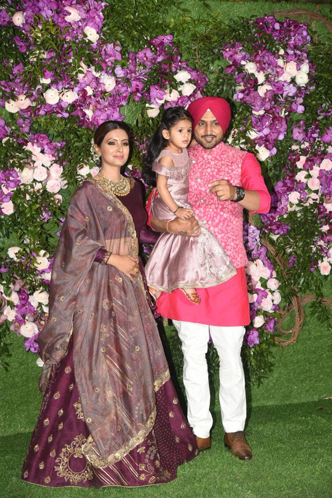 Harbhajan Singh and his wife Geeta Basra attended the grand wedding of industrialist Mukesh Ambani's son Akash Ambani with Shloka Mehta. Their little daughter Hinaya Heer Plaha looked cute in grey dress