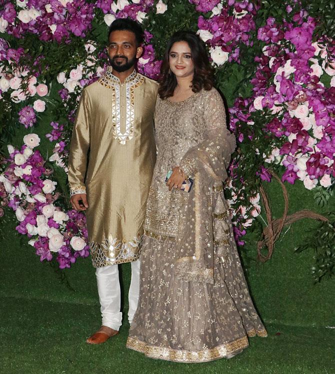 Rahane and wife