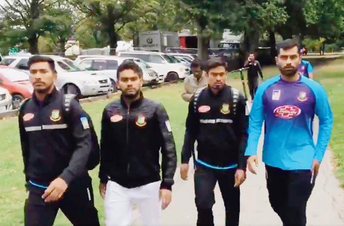 The above video grab tweeted by a Bangladeshi journalist shows the players escorted back to the hotel