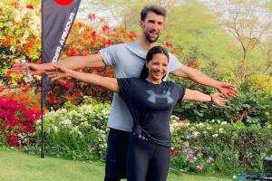 Deanne Panday has a fangirl moment with Olympian swimmer Michael Phelps