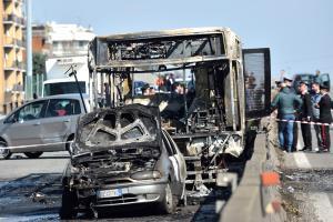 Driver hijacks school bus in Italy, sets it on fire