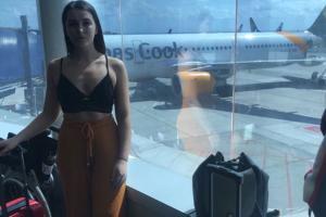 Woman wears crop top on flight; airline tells her 'cover up' or get off