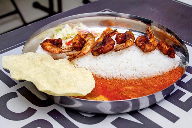 The prawn curry rice plate is priced at Rs 249