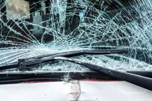 School bus hits road barricades; kills cleaner in Goregaon