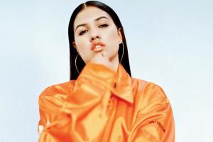 Three songs you must have on your playlist on repeat 