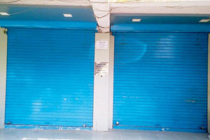 Shutters are down at the rented office of Sainergy Cabs