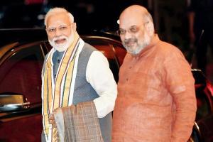 Narendra Modi to fight from Varanasi, Gandhinagar goes to Shah