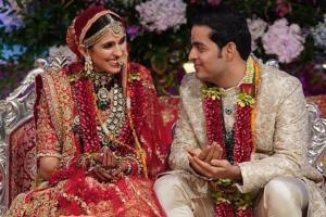 Akash Ambani's bride Shloka Mehta looks ethereal in an all-red avatar!