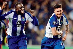 Alex Telles takes Porto into quarter-finals of Champions League