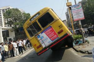 Mumbai: School bus climbs up a divider in Kandivli, two students hurt