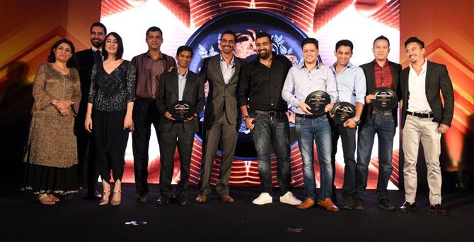 Arjun Rampal with the winners of the Best New Bar category, Jagran President Apurva Purohit (extreme left) and mid-day executive editor Tinaz Nooshian (second from left)