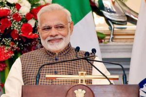 Narendra Modi releases visually impaired friendly coins