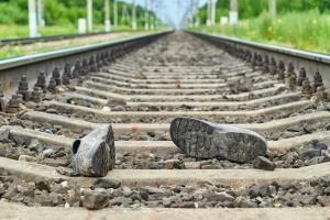 Woman dead as train rams into two-wheeler at unmanned crossing