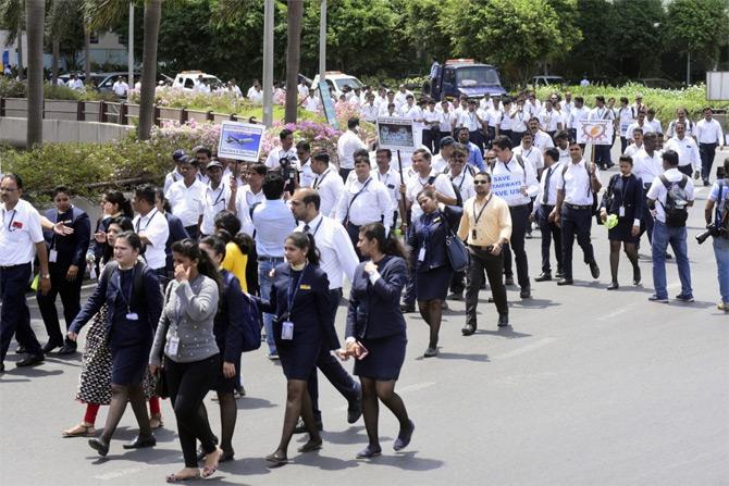 Hundreds of Jet Airways employees including pilots, engineers, and cabin crew organised a peaceful protest requesting the government's interference to save the airline from its crisis situation