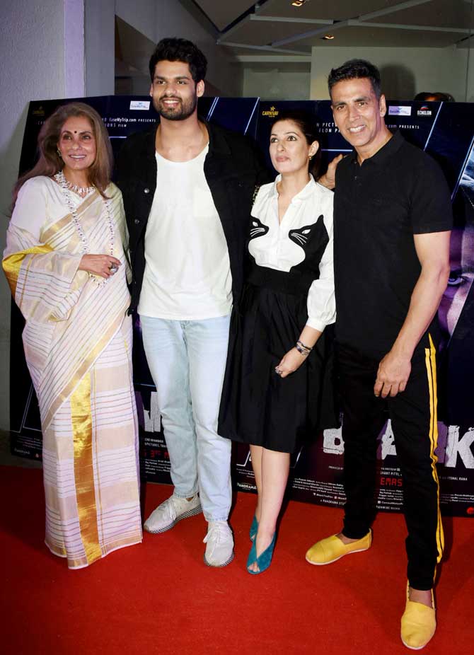 Ali Ali features Akshay Kumar with the lead, Karan Kapadia, where the two can be seen dressed in ritzy clothing. The sets are dramatic and stirring. The song has been penned by Arko and Adeip Singh and sung by B Praak and Arko.
In picture: Dimple Kapadia, Karan Kapadia, Twinkle Khanna and Akshay Kumar pose for the shutterbugs at the screening. 