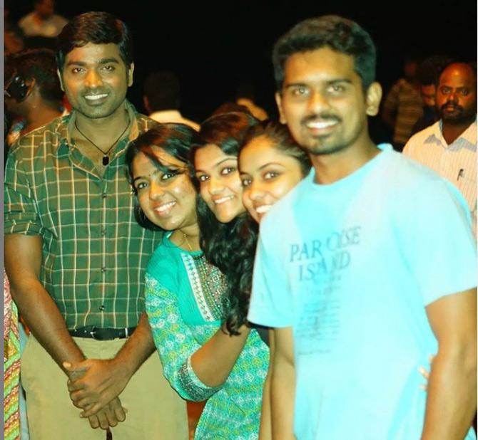 In his IPL career, Murugan Ashwin has played a total of 22 matches, bagging 15 wickets at an average of 36.60 and economy rate of 7.89. His best bowling figures are 3/36.
In picture: Murugan Ashwin and wife with actor Vijay Sethupathi