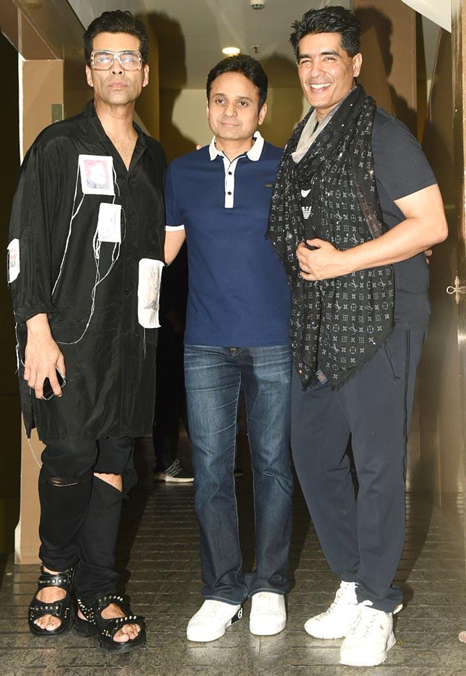 Karan Johar, producer Apurva Mehta and Manish Malhotra at the special screening of Student of The Year 2.