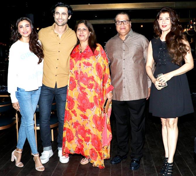 Freddy Daruwala is currently seen in web series Poison alongside Arbaaz Khan, Riya Sen, Saqib Saleem among others.
In picture: Freddy Daruwala with Daisy Shah, Ramesh Taurani and Sangeeta Bijlani pose for the photographers.