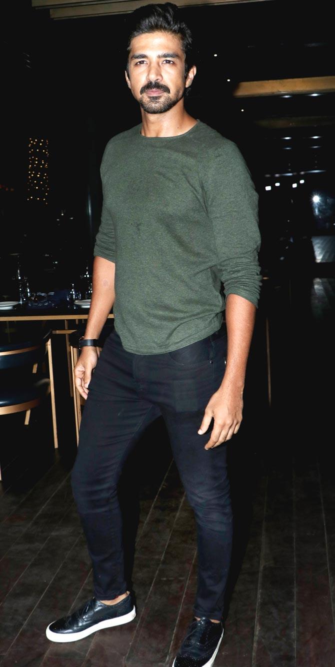 Saqib Saleem poses for the photographers at Freddy Daruwala's birthday bash at a popular restaurant in Mumbai.
